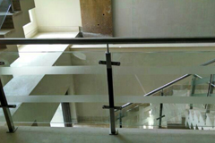 glass railing with wooden top